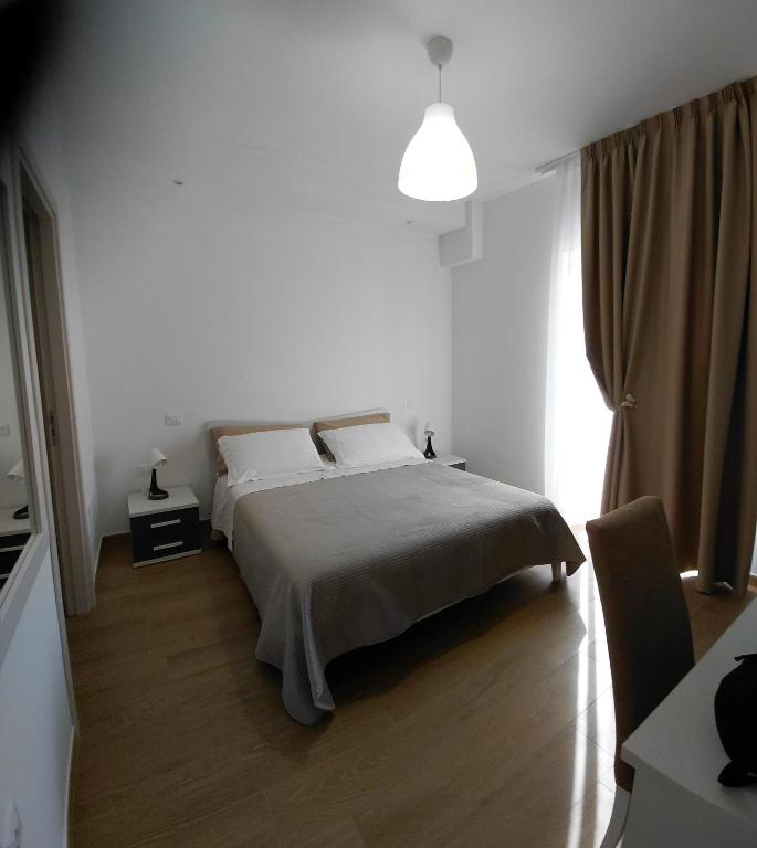 Llit o llits en una habitació de Makasa