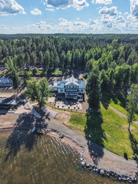 an aerial view of a large house with trees at Radalla Resort in Kausala