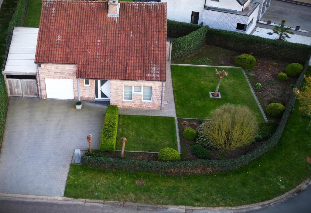 an aerial view of a house with a yard at Owla-Stay in Heusden - Zolder
