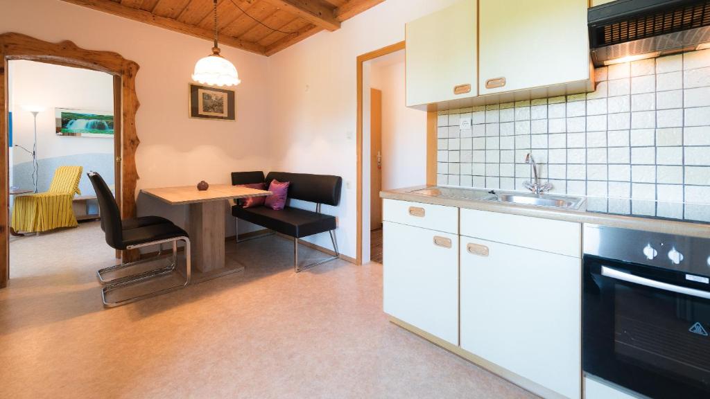 Kuchyňa alebo kuchynka v ubytovaní Apartments Presslauer - Mori