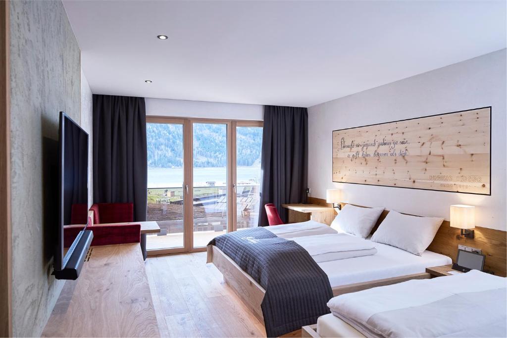 Beachfront · Private Beach Familienresort Buchau - Camera Familiare Con Vista Lago