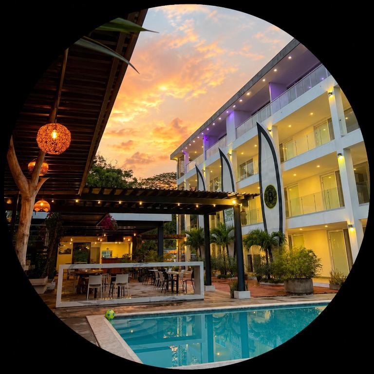 a view of a hotel with a swimming pool at The Views Resort in El Zonte