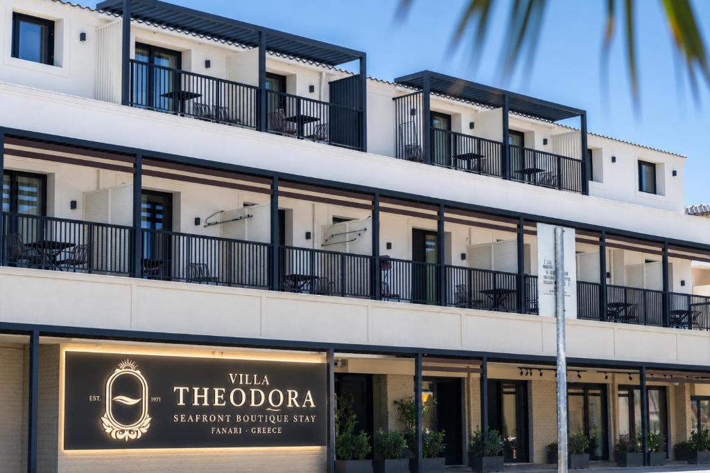 an exterior view of a building with balconies at Villa Theodora Boutique Stay in Fanari
