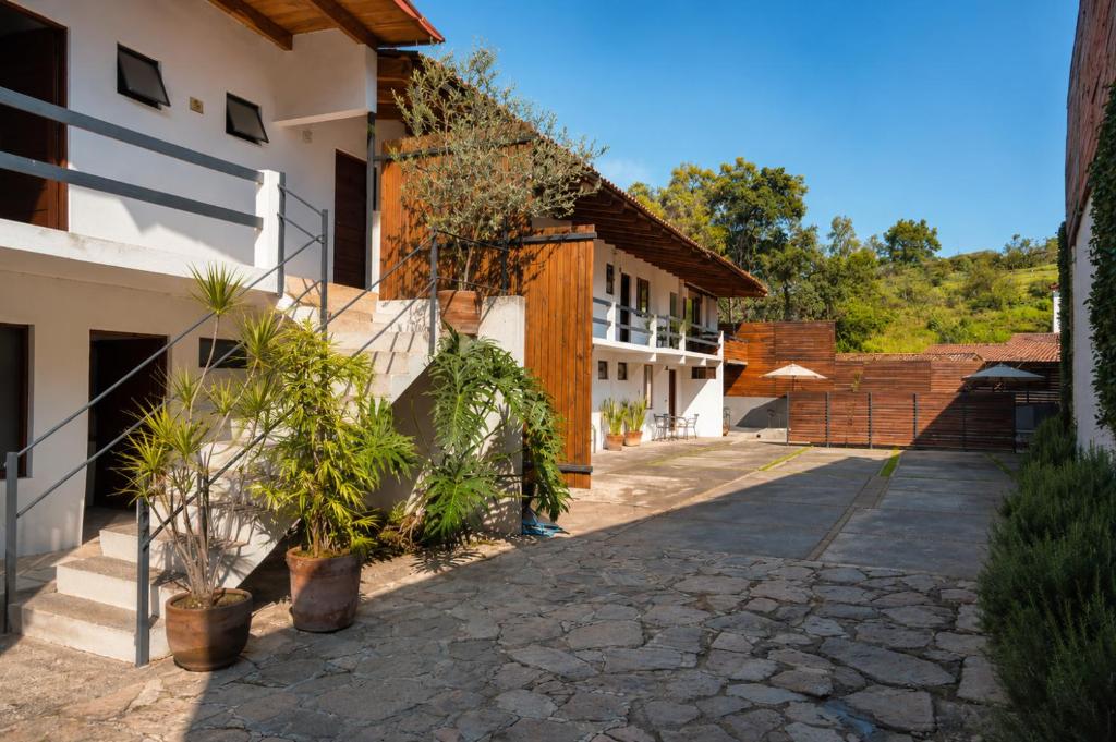 a walkway in front of a building at Villa Maria Hotel in Valle de Bravo