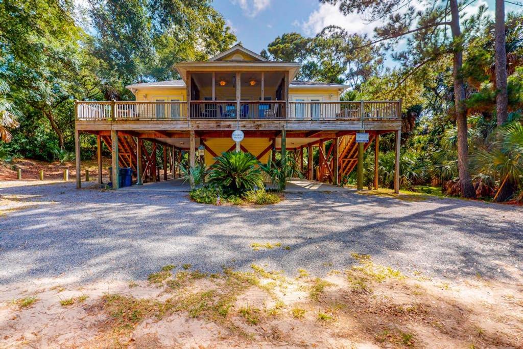 a large house with a large deck on top of it at Morillo's Miracle in Edisto Beach