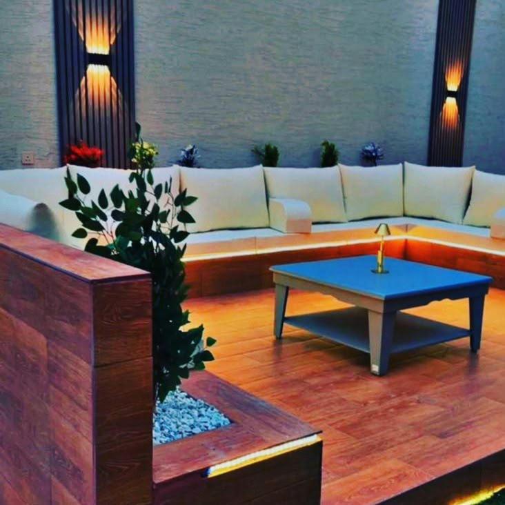 a living room with a couch and a coffee table at شاليهات سمو بارك in Taif