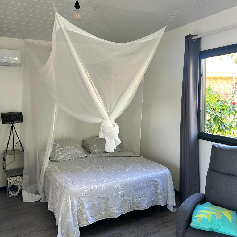 LE FARE BLEU ITI Bungalow climatisé en bord de lagon à Tiputa Rangiroa - Demi-pension & vélos gratuits - photo 2 - Rangiroa, Polynésie