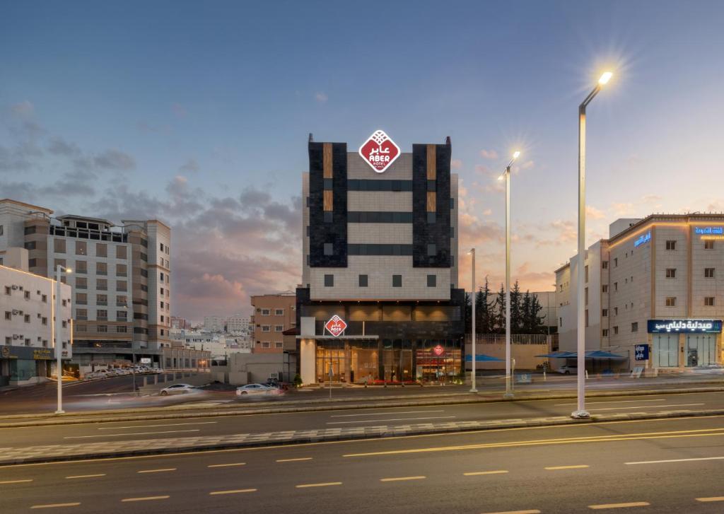 a building with a stop sign on top of it at Aber Abha in Abha