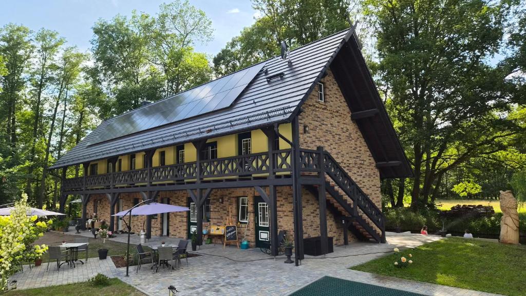 a model of a house with a solar roof at Stara Broznja in Burg