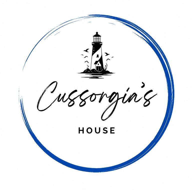 a badge with a lighthouse and the words queensopus house at Cussorgia's House in Calasetta