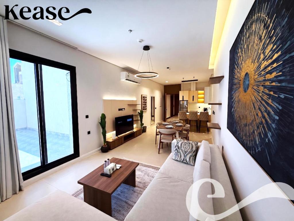 a living room with a couch and a table at Kease Hittin S-18 Latest Development ZA44 in Riyadh