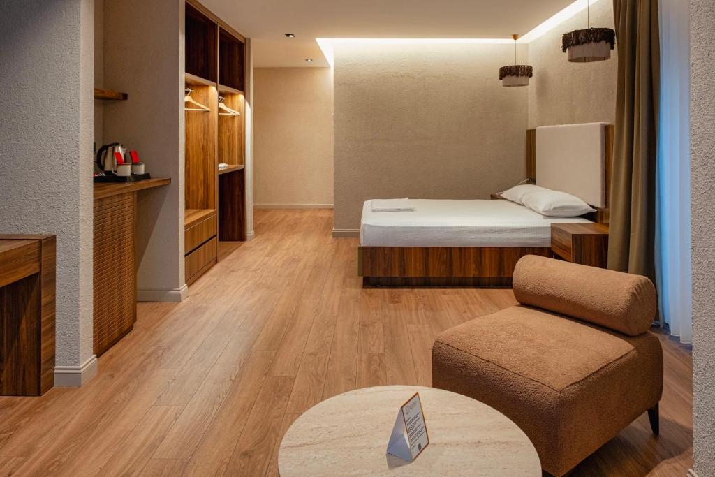 Lova arba lovos apgyvendinimo įstaigoje Dumer Butik Hotel