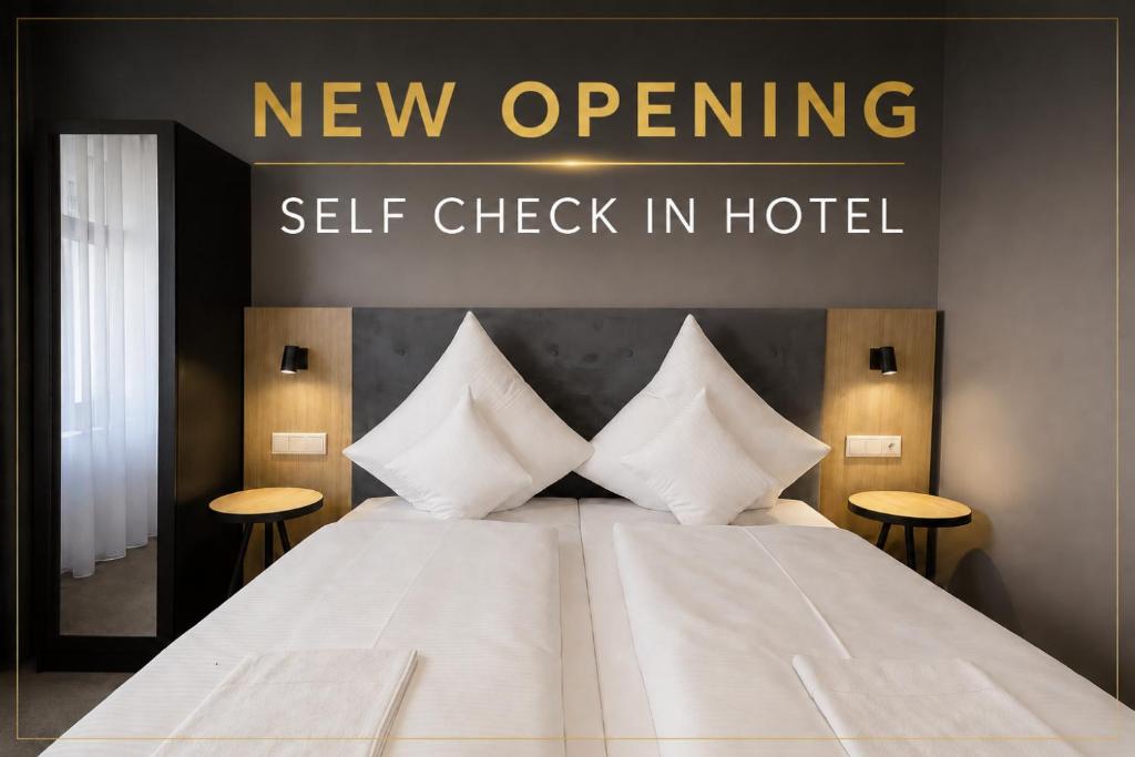 a new opening sign above a bed in a hotel at HI Grand City Hotel in Hannover