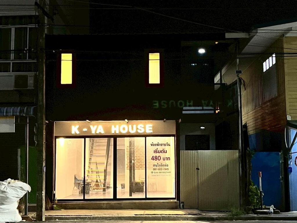 a store front of a va house at night at K-YA house in Phitsanulok