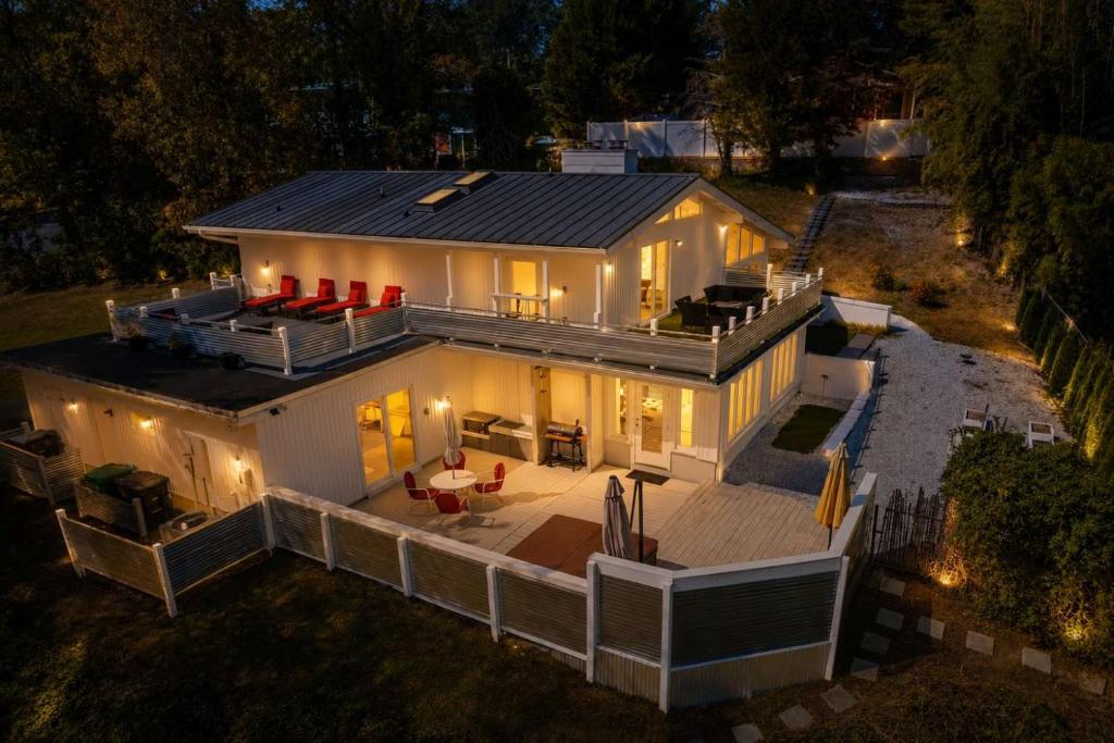 an aerial view of a house with lights at Modern Retreat Hot Tub Bar Patio HPU in High Point