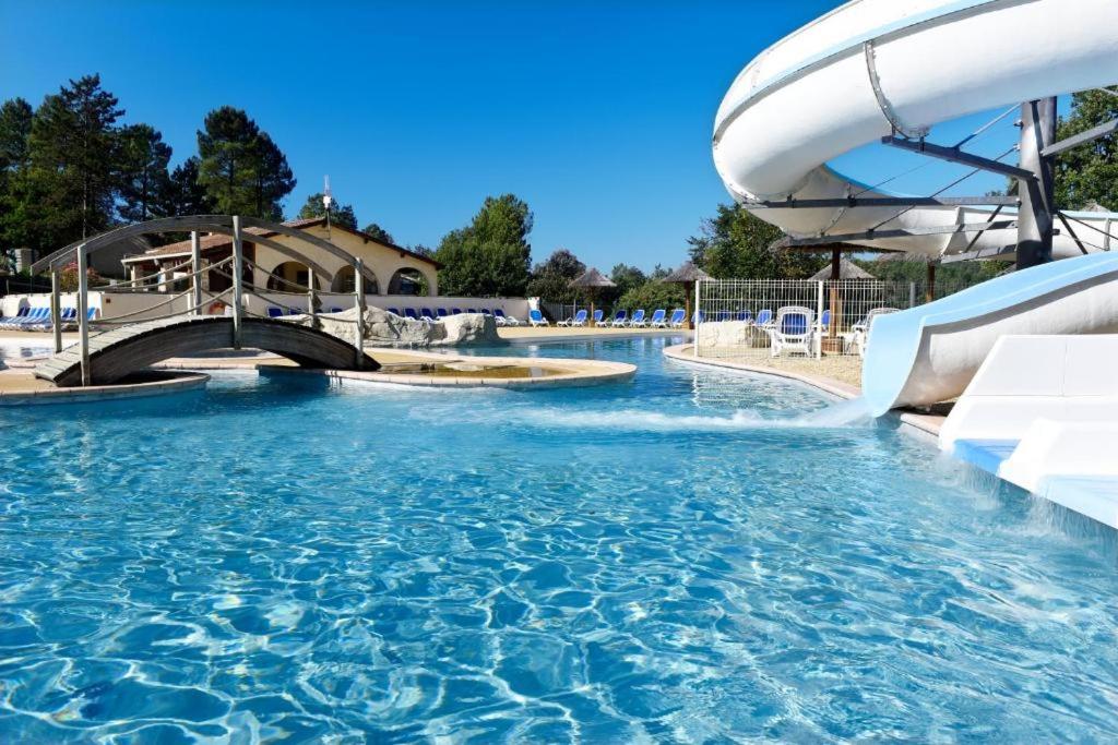 a water slide at a water park at La TERRASSE in Salavas