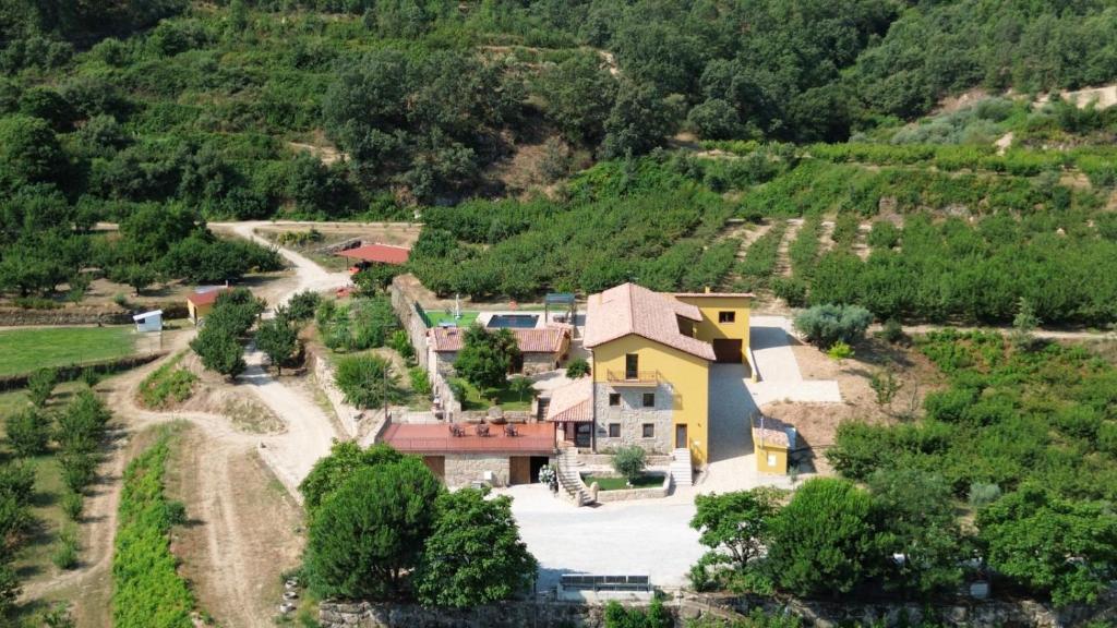 an aerial view of a house on a hill at Quinta do Limite - Country House in Covilhã