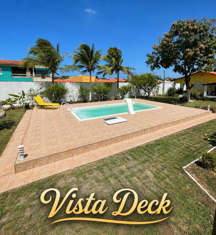 a view of a swimming pool in a yard at Paracuru Praia in Paracuru