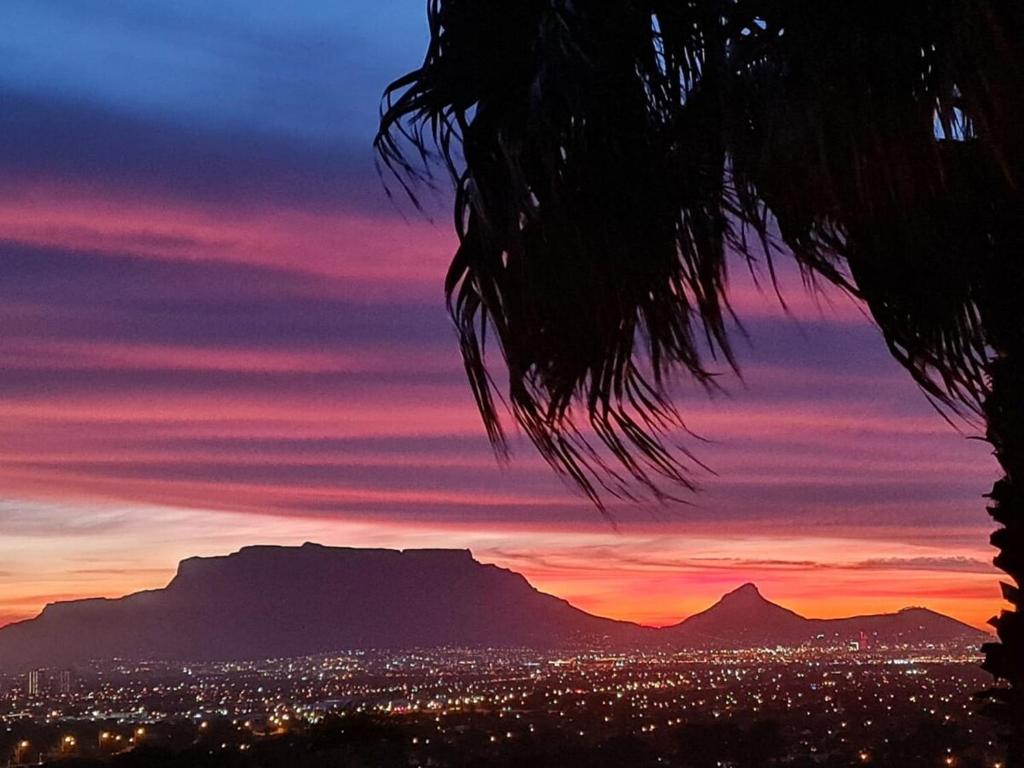 a view of the table mountain at sunset at Palm Zicht in Cape Town