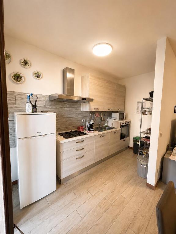 Majoituspaikan Cornaro Apartment keittiö tai keittotila