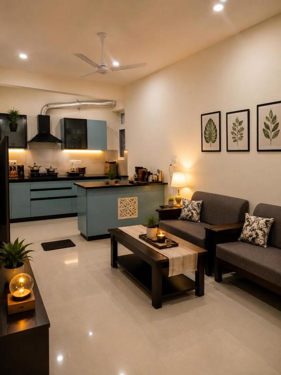 a living room with a couch and a table at Halfway Home Cozy 2bhk in Rājpur