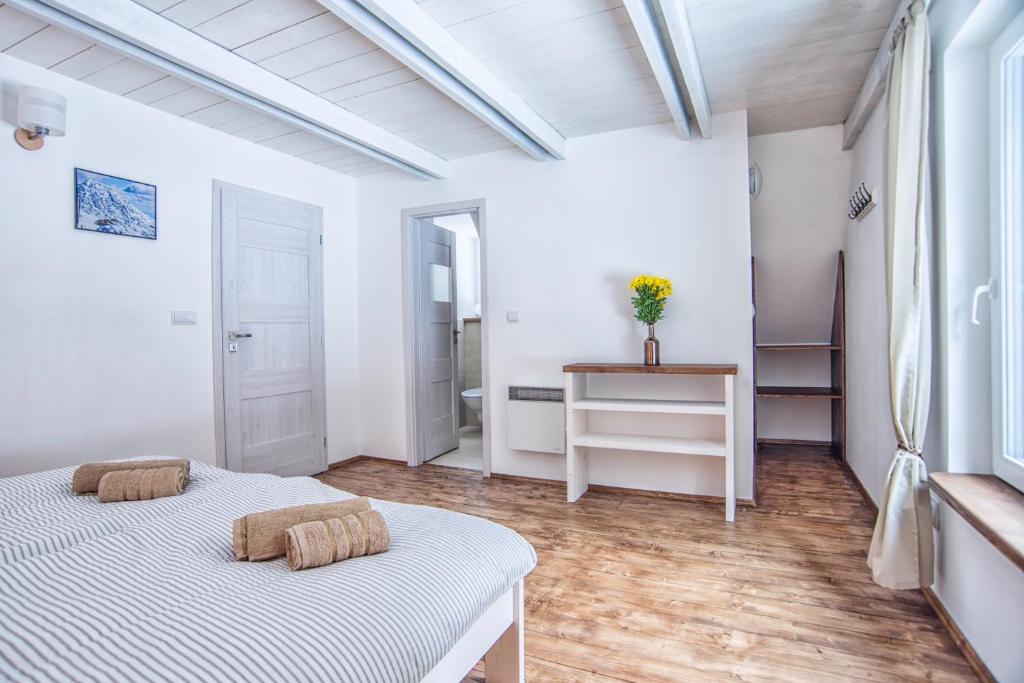 Postel nebo postele na pokoji v ubytování Chata Kamenie