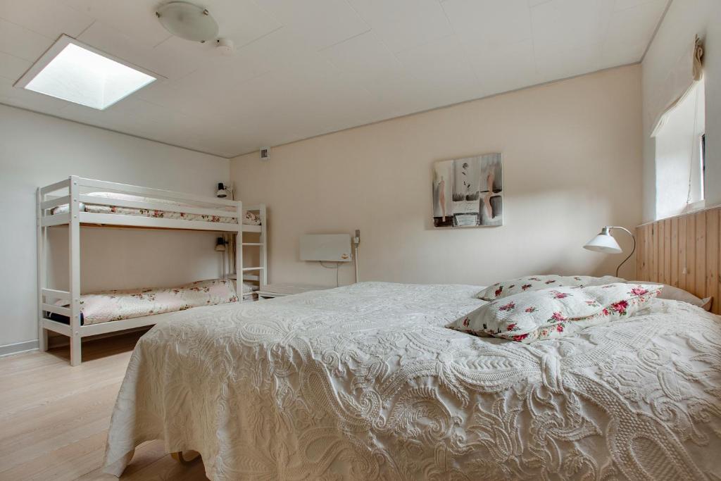 Postel nebo postele na pokoji v ubytování Skovboferie Apartments BB