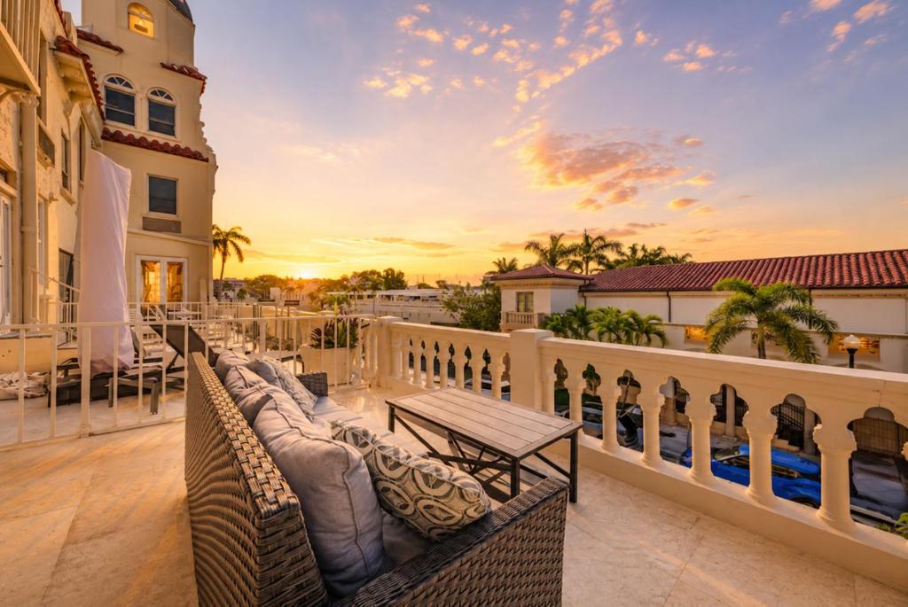 a balcony with a view of the ocean on a house at 1BR Retreat with Private Terrace in Palm Beach