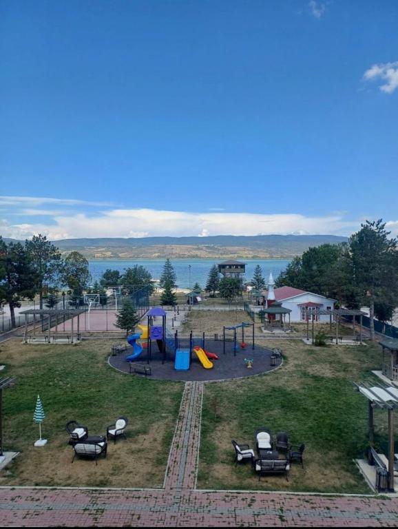 an aerial view of a park with a playground at Gölpark Otel in Yeniçağa