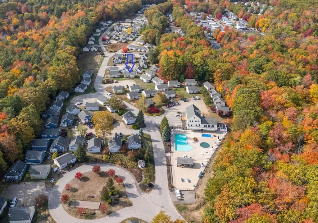 an aerial view of a resort in the woods at Private and Peaceful 2-Bedroom Cottage on Resort close to the beach! in Wells