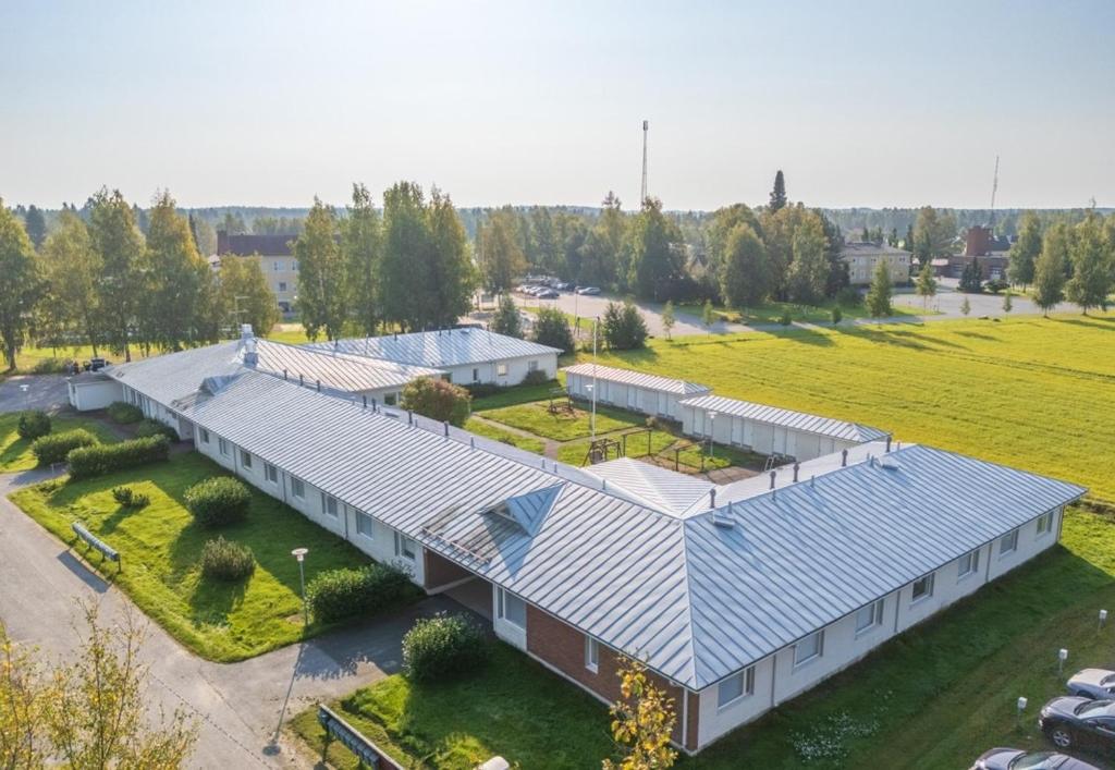 an aerial view of a house with a roof at Mysig Lägenhet in Kokkola