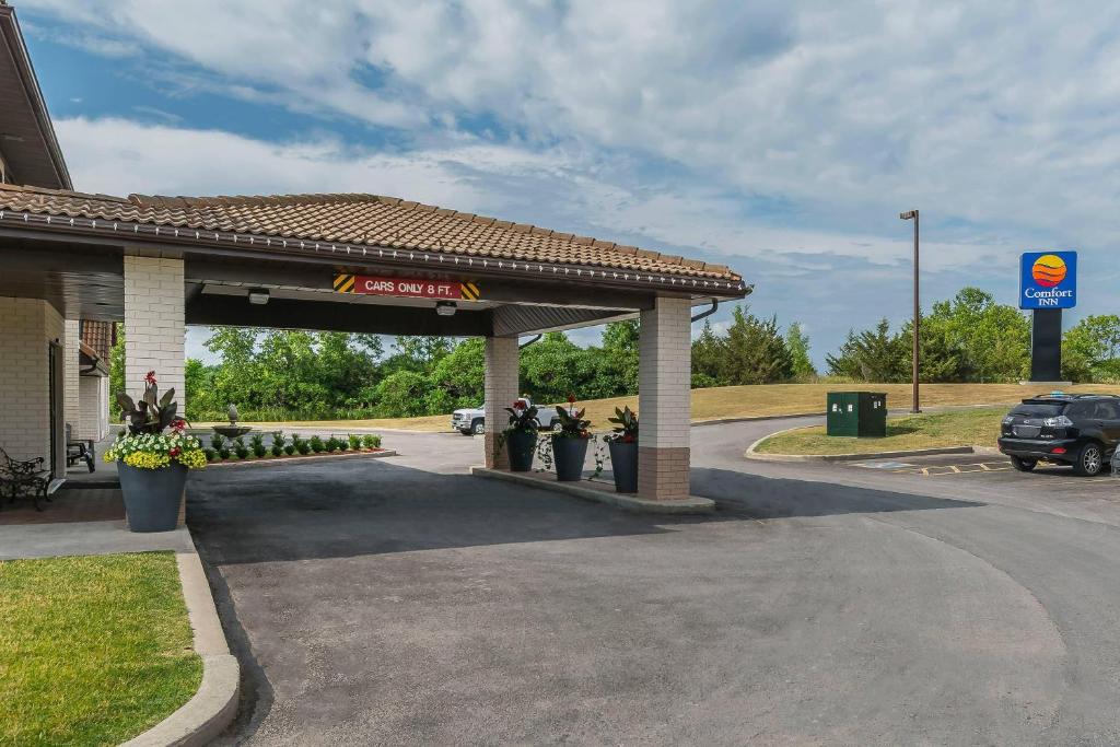 a gas station with a sign on the side of it at Comfort Inn Trenton in Trenton