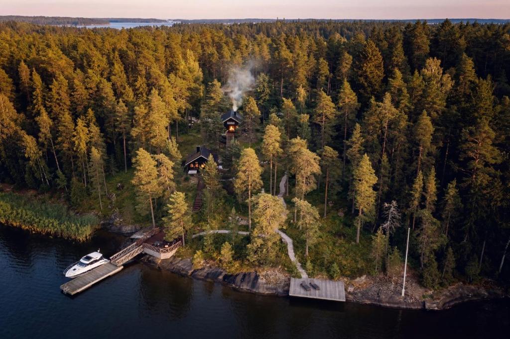 an aerial view of a house on an island in the water at Stay North - Ösund in Helsinki