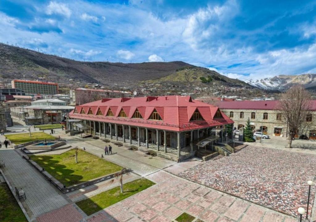 an overhead view of a building with a red roof at Passage Hotel Restaurant in Goris