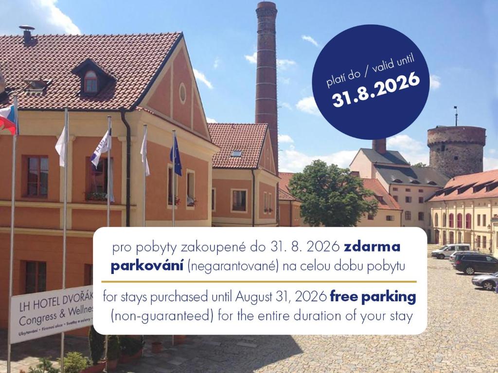 a flyer for a building with a sign in front of it at LH Hotel Dvořák Tábor Congress & Wellness in Tábor