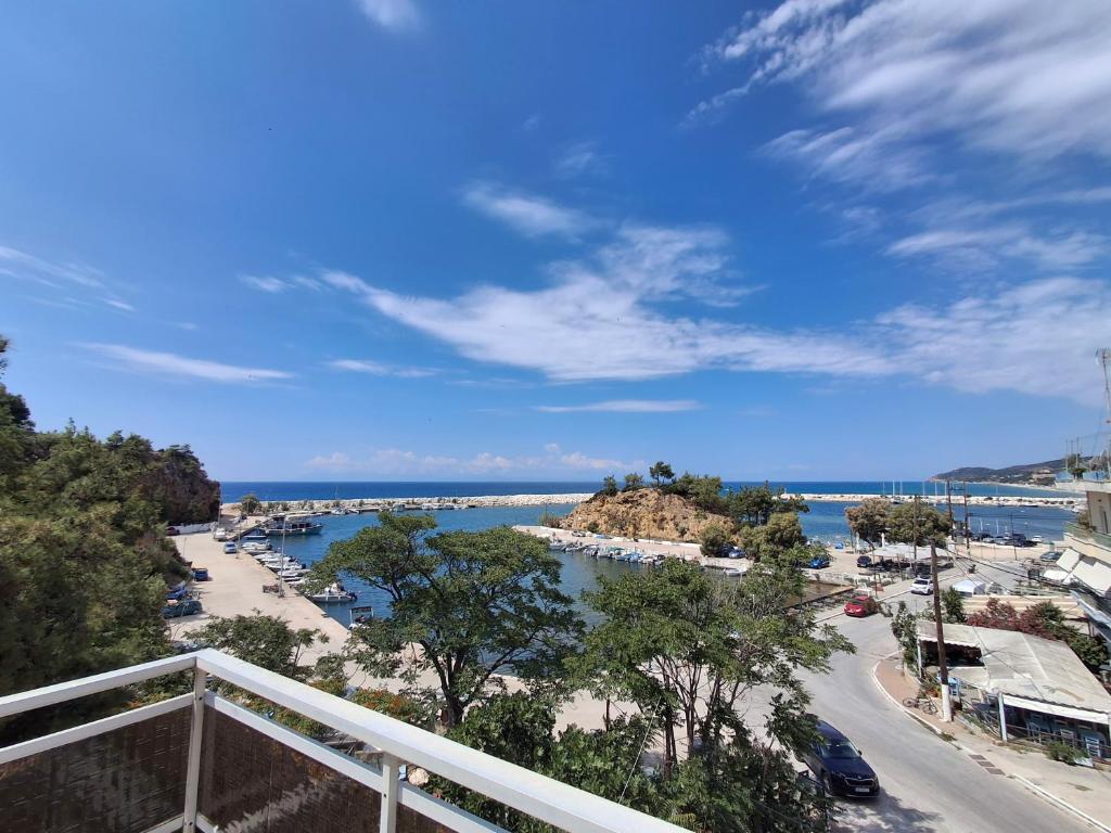 a view of a river from a balcony at Studios Elena Central in Limenaria
