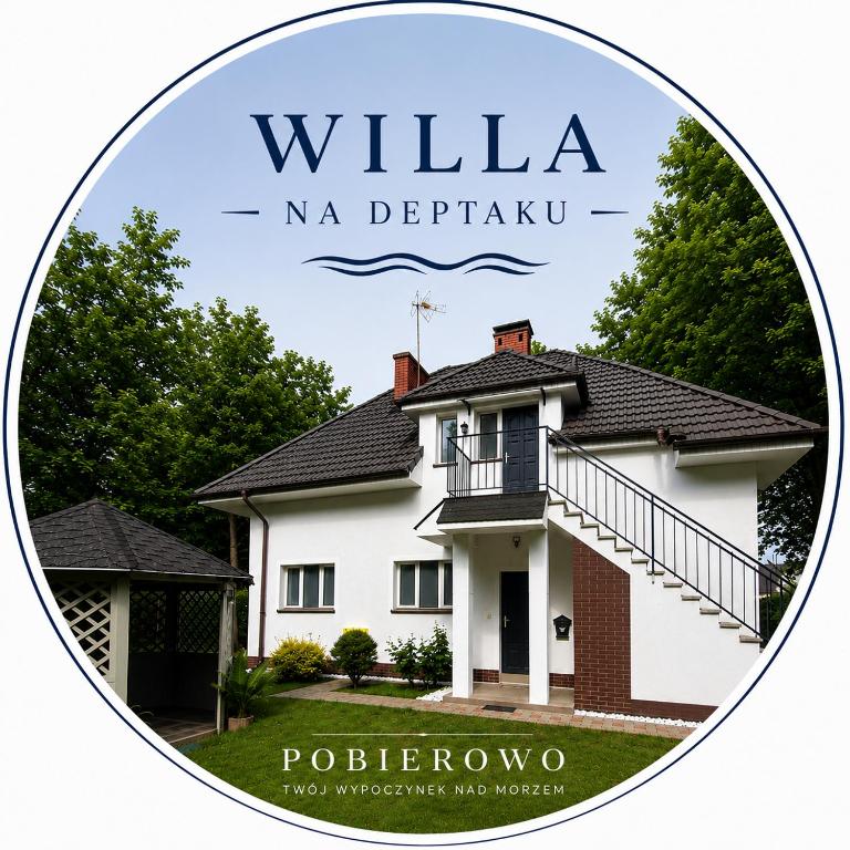 a picture of a white house with the words willemia naa detroit at Willa Na Deptaku in Pobierowo