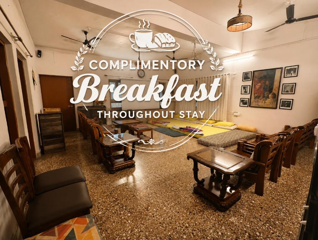 a barbershop with chairs and a sign that readsurrencybreakfast throughput stay at The Castle Villa,4BR Family Retreat , Projector,Free Parking,MTDC Approved in Nashik