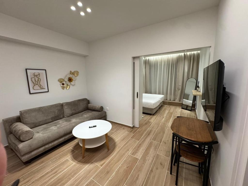 a living room with a couch and a table at Kiato City Stay in Kiaton