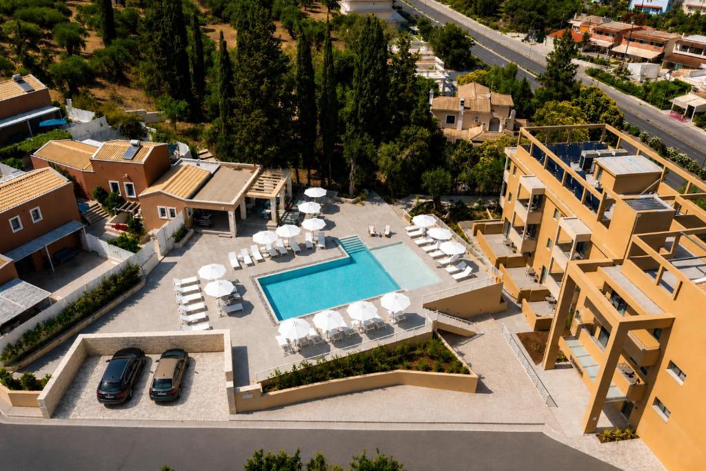 an aerial view of a villa with a swimming pool at Tessera Boutique Hotel & Villas Collection in Gouvia