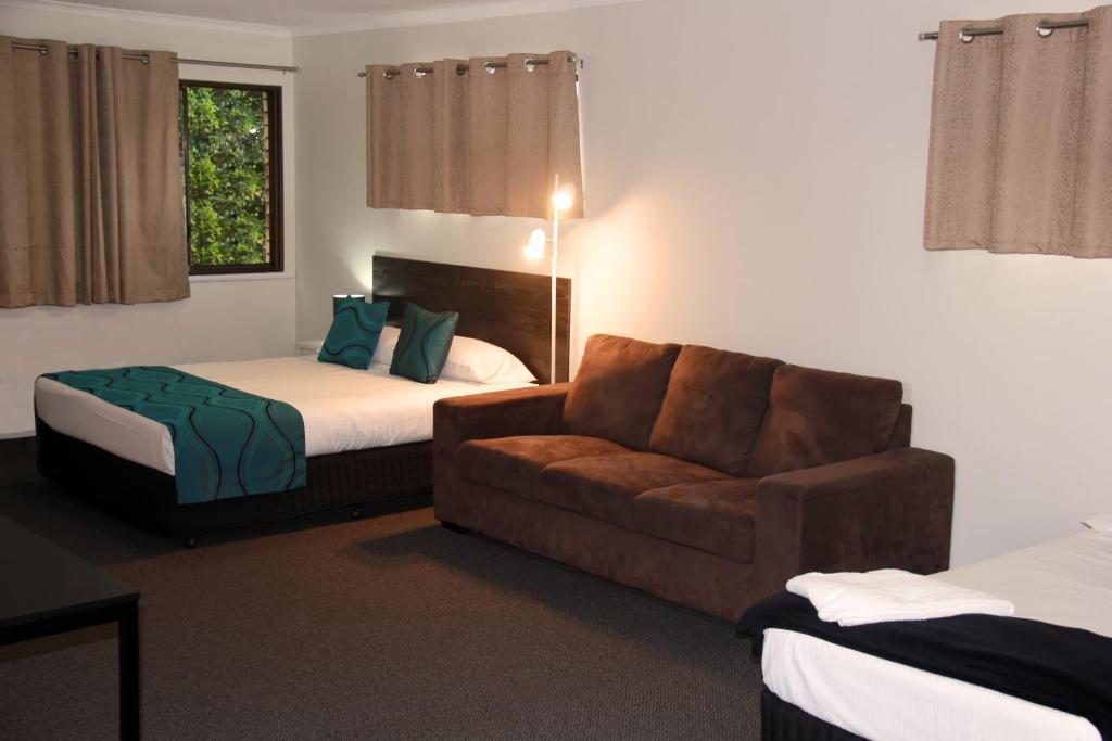 Postel nebo postele na pokoji v ubytování Motel in Nambour