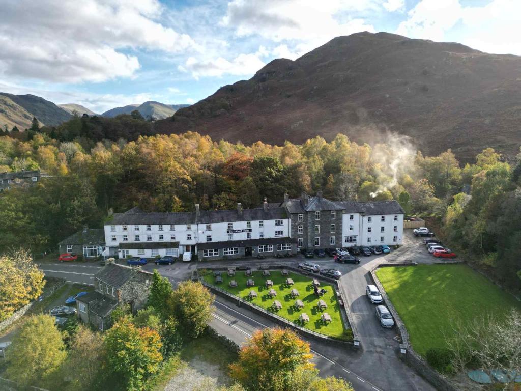 an aerial view of a building with a park at Patterdale Hotel in Patterdale