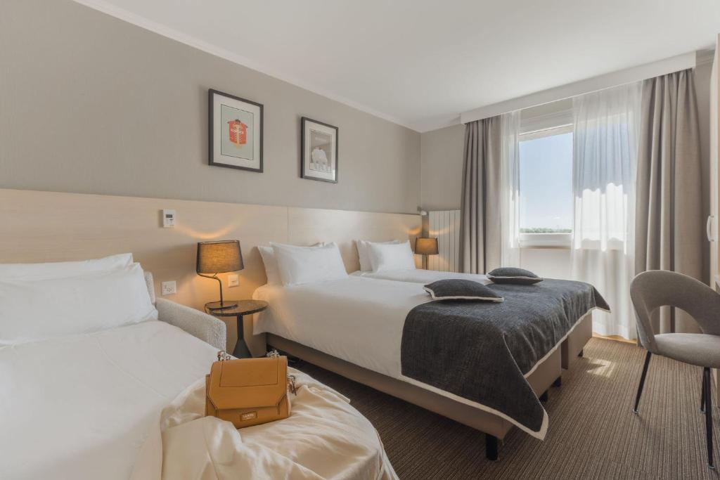 Everness Hotel & Resort - Triple Room