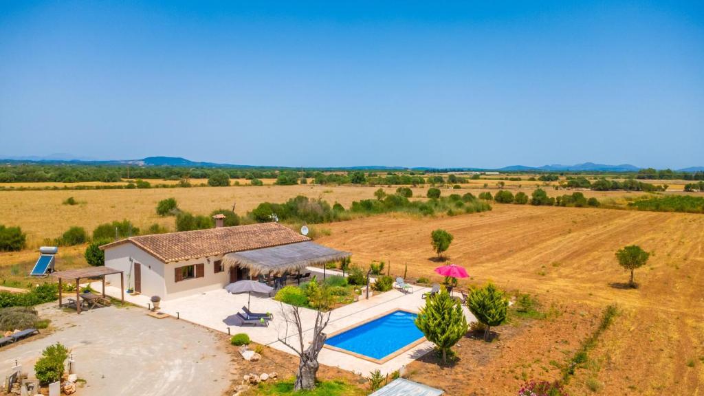 an aerial view of a house with a swimming pool at Son Fred in Felanitx