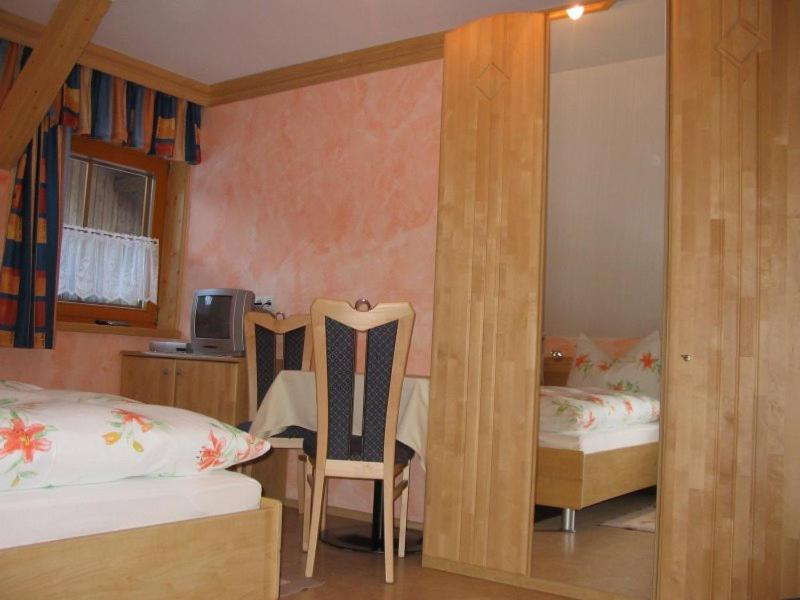 Postel nebo postele na pokoji v ubytování Gratzerhof