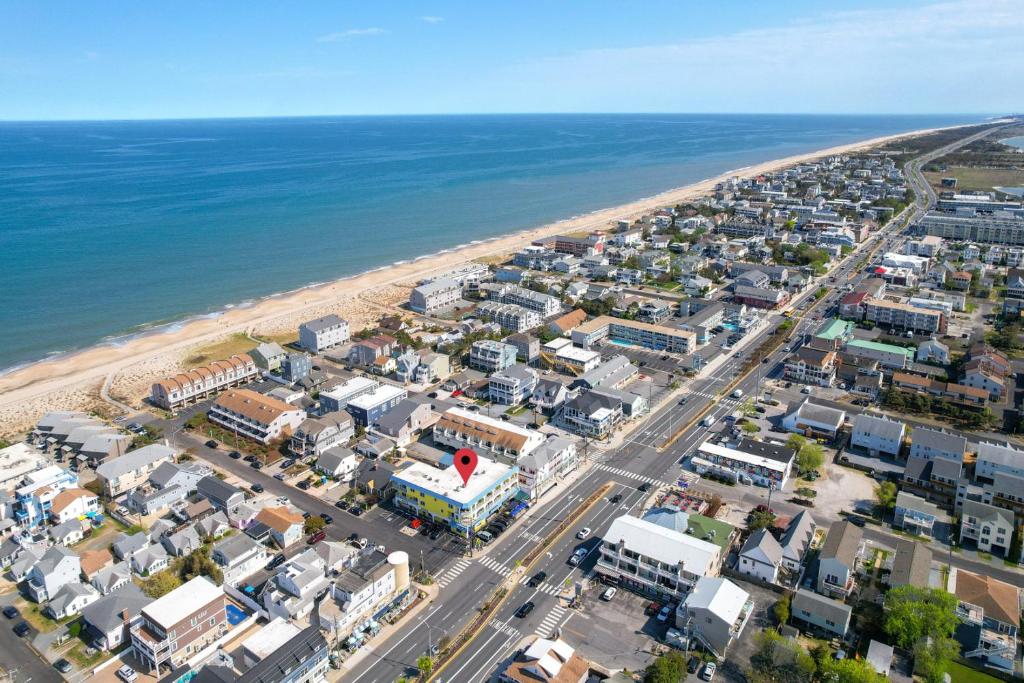 an aerial view of a city and the beach at SURFRIDER Dewey Beach Ocean Block in Dewey Beach