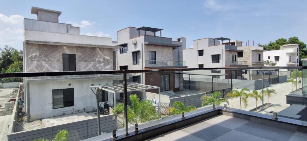 an aerial view of a building with a balcony at Villa Riviera in Covelong