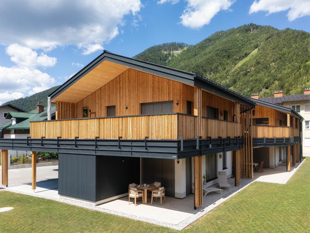 an exterior view of a house with a deck at Gratzenthal Boutique Apartments in Hollenstein an der Ybbs