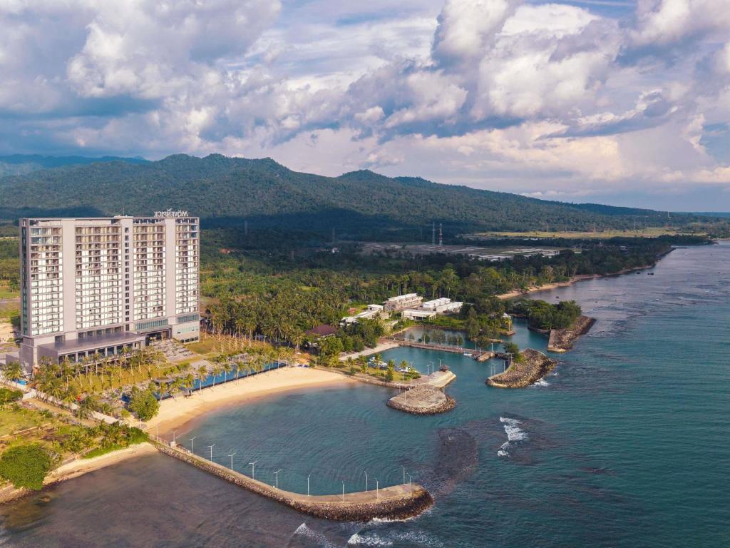 an aerial view of a resort and a beach at Mövenpick Resort Carita in Serang