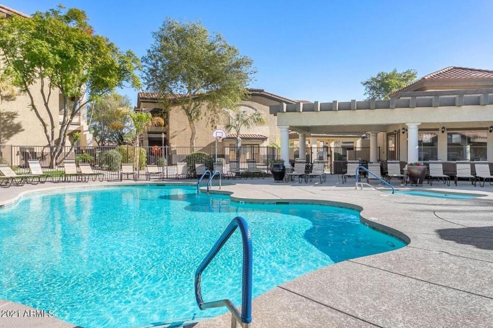 a swimming pool in the courtyard of a hotel at Southern #1083 Mesa in Mesa